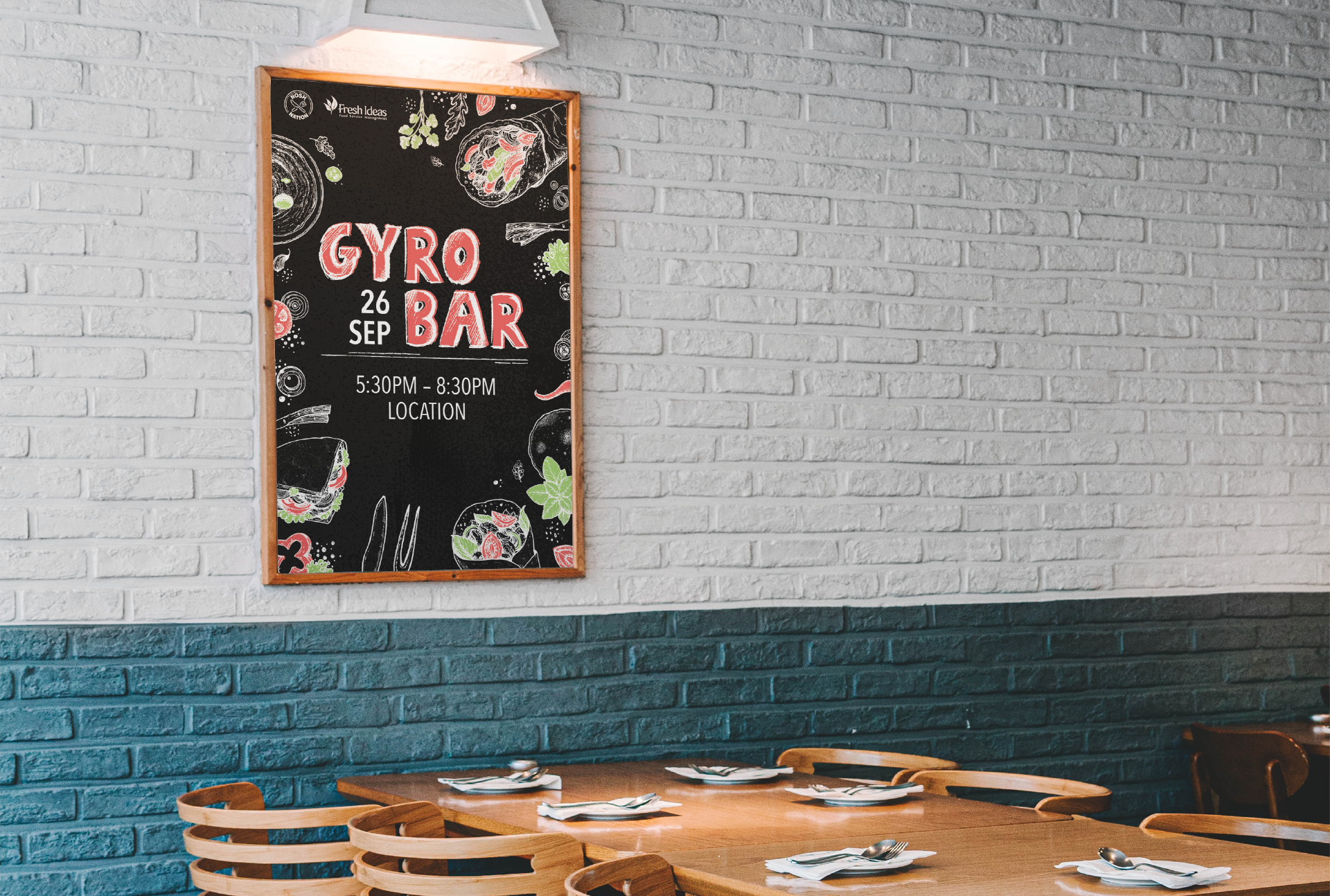 An ad for Gyros Bar hanging in a frame above a table