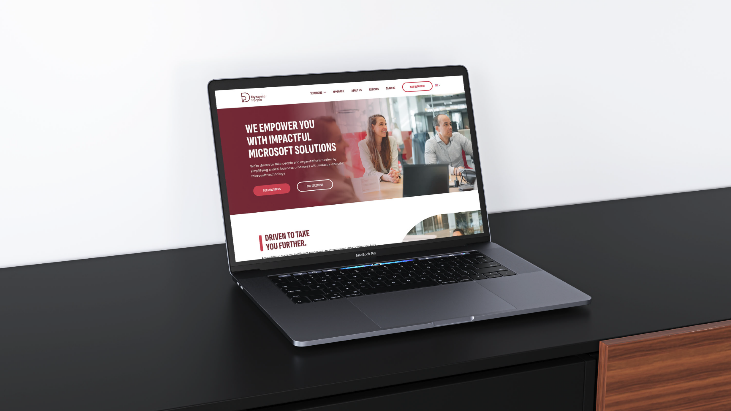 Dynamic People website mocked up in a computer screen